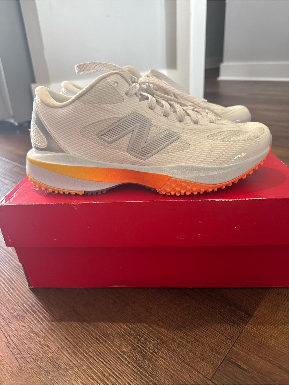 New Balance White turf Sneakers with Orange Gradient Detail